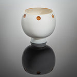 Elegant Night Light Bowl with a golden brown hand carved circle design, unlit