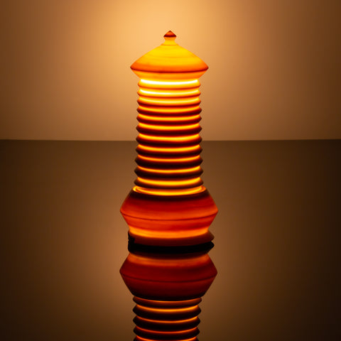 Exquisite hand thrown Porcelain Lantern Lamp, giving of a warm subtle glow as the light shines through the porcelain clay