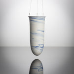 Stylish Slim Hanging Vase with swirls of blue running through the porcelain clay