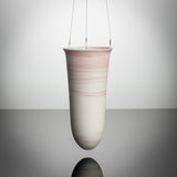 Stylish Slim Hanging Vase with swirls of soft red running through the porcelain clay